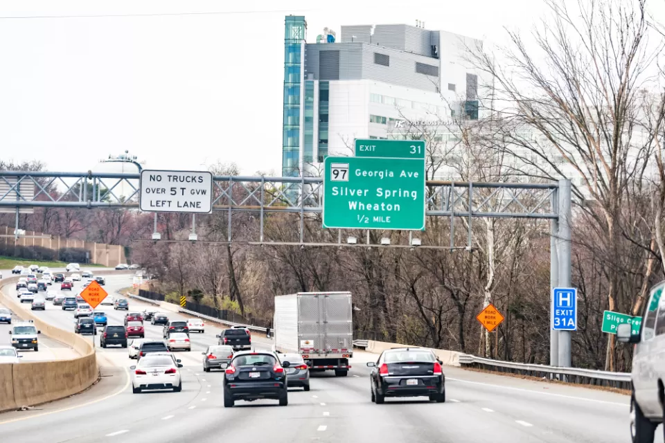 A freeway in Maryland near Washington, D.C., on the Capital Beltway with an exit sign for Wheaton.